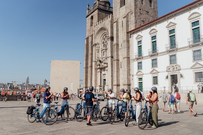 3-Hour Porto Highlights on a Electric Bike Guided Tour - Clérigos Tower and the Livraria Lello outside view