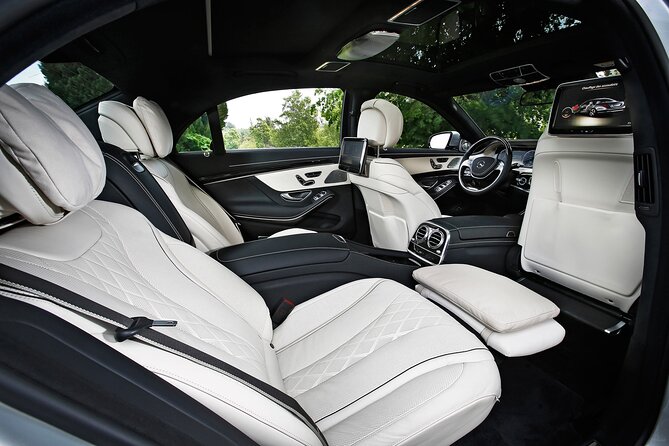 Arrival Transfer: Porto Airport OPO to Porto in Luxury Car - OPO Meet-and-Greet With Name Sign and Luggage Help