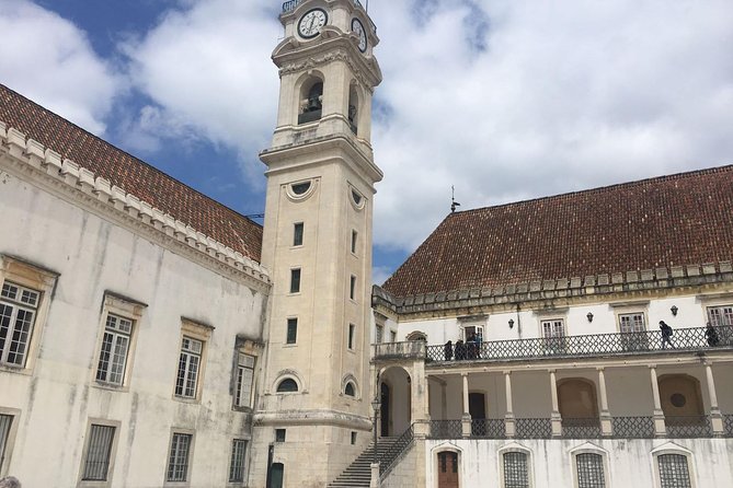Aveiro and Coimbra Small Group Tour with Moliceiro Boat Cruise - Lunch time by the water, then Costa Nova for the stripes