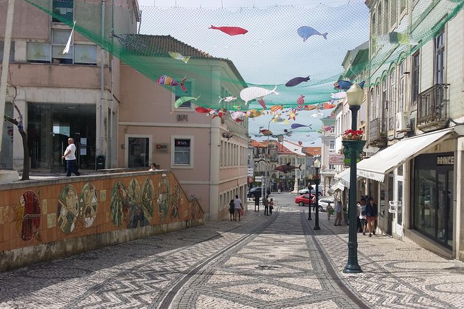 Aveiro Small Group Tour with Typical Boat Ride, offer wine bottle - Monumento ao Ovo Mole: Ovos Moles Tasting Included