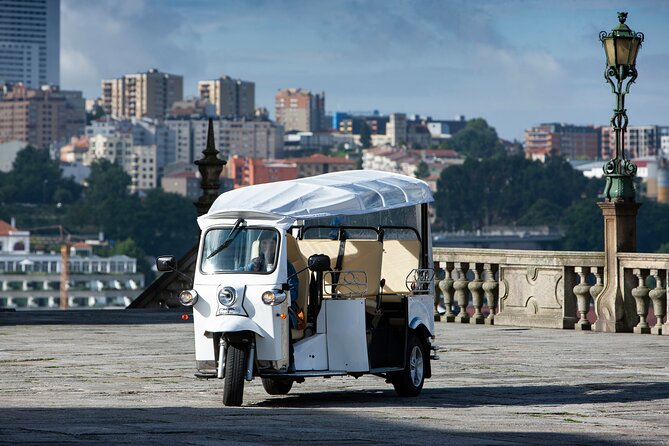 Discover Porto's Highlights on a 2-Hour Private Electric Tuk Tuk - Through Batalha: São João National Theatre and a Real Neighborhood Pace