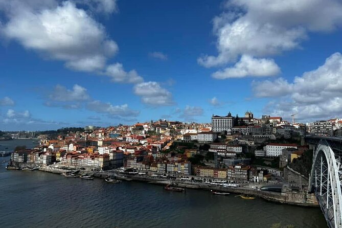 Discover Porto with an Official Guide: A Tour of Iconic Landmarks - Rua das Flores and Praca da Liberdade: street life plus big-city structure