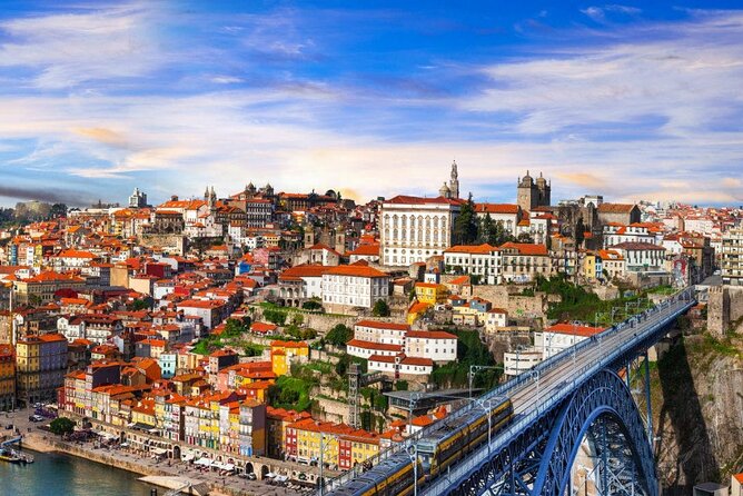 Discover the Charm of Porto with a Picturesque Private Journey - Praca Da Ribeira: Riverside Streets and an Easy Meal Pause