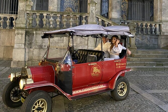 Explore Porto Aboard A Classic Tuk-Tuk tour 1h - Stop 6: Livraria Lello pass-by, famous bookstore energy