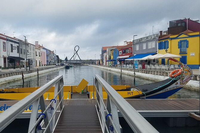 From Aveiro: Costa Nova, Barra, Vista Alegre - Half-Day Trip - Praia da Barra: the sea opening built from medieval city-stone