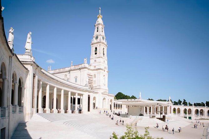 From Porto: Fátima and Coimbra Full Day Tour - Stop in Fátima: the story behind the pilgrimage