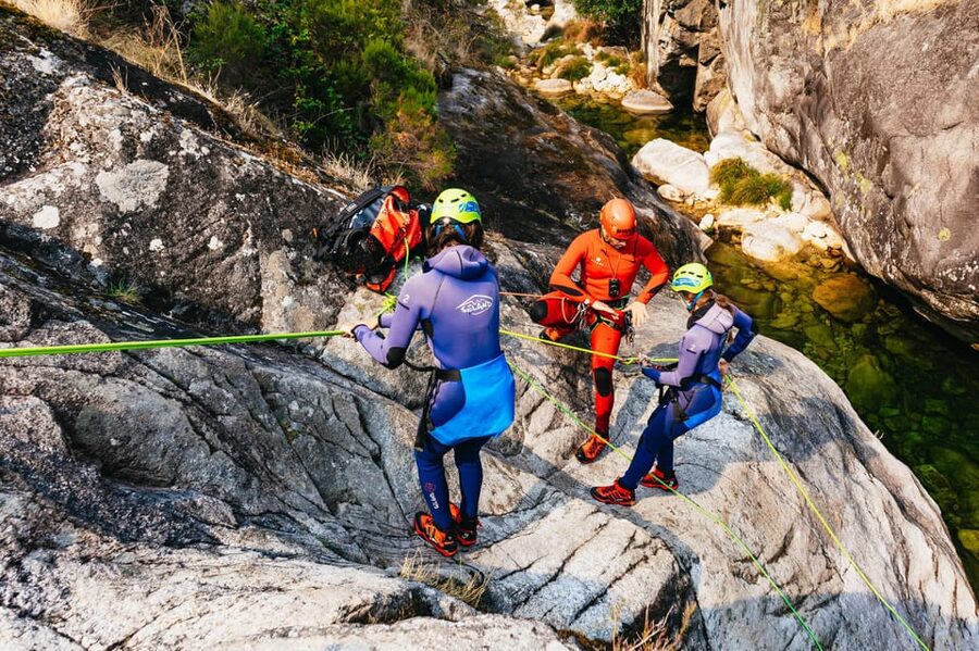 From Porto: Gerês National Park Canyoning Trip - Walking the canyon flow: slides, swimming, and natural pools