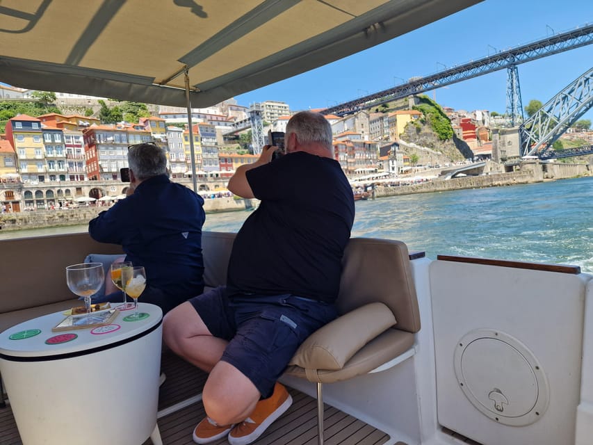 Porto: 6 Bridges Cruise & Port Wine with Sunset Option - Settling in on the boat: small group comfort and photo-friendly space