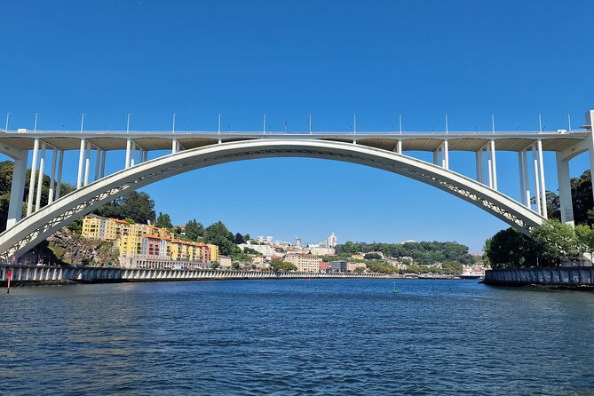 Porto: 6 bridges tour, Douro river with 4 Port Wine tasting - Eiffel’s old train bridge and the new train bridge: engineering you can feel
