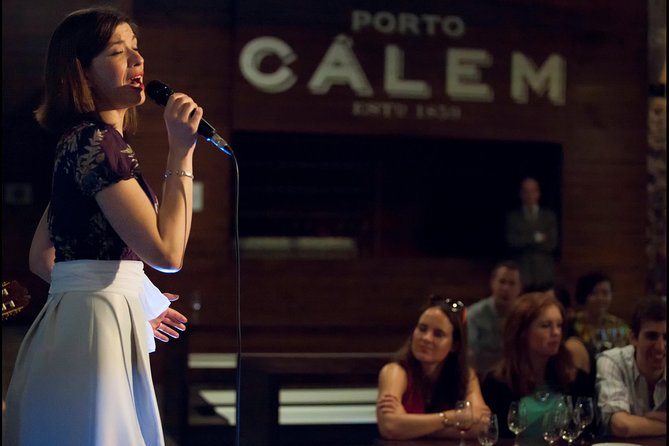 Porto: Cálem Cellar Tour, Live Fado Show and Wine Tasting - Live Fado show in the caves: two voices, real instruments, real mood