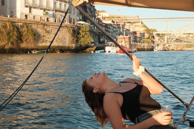 Porto: Douro River Boat Cruise with Port Wine and Snacks - C de Gaia, port wine cellars, and the skyline from across the river