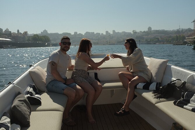 Porto: Douro River Boat Cruise with Port Wine and Snacks - Dom Luís I Bridge and Porto’s Ribeira, seen at water level