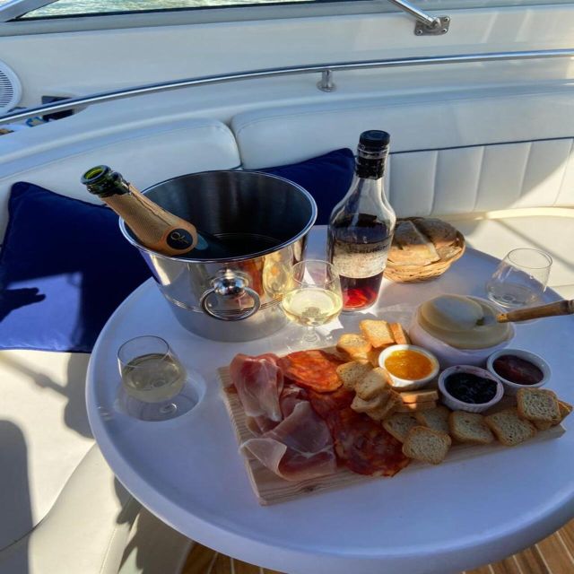 Porto: Douro River Boat Tour w/ Portuguese Wines & Tasting - What’s included on the water: green wine, port, and local treats