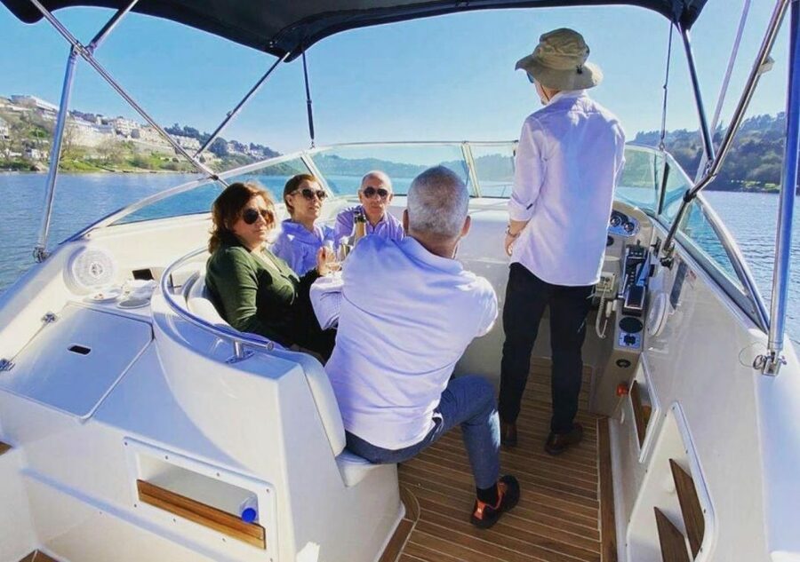 Porto: Douro River Boat Tour w/ Portuguese Wines & Tasting - Onboard setup: SMILE, two skippers, and an unhurried pace