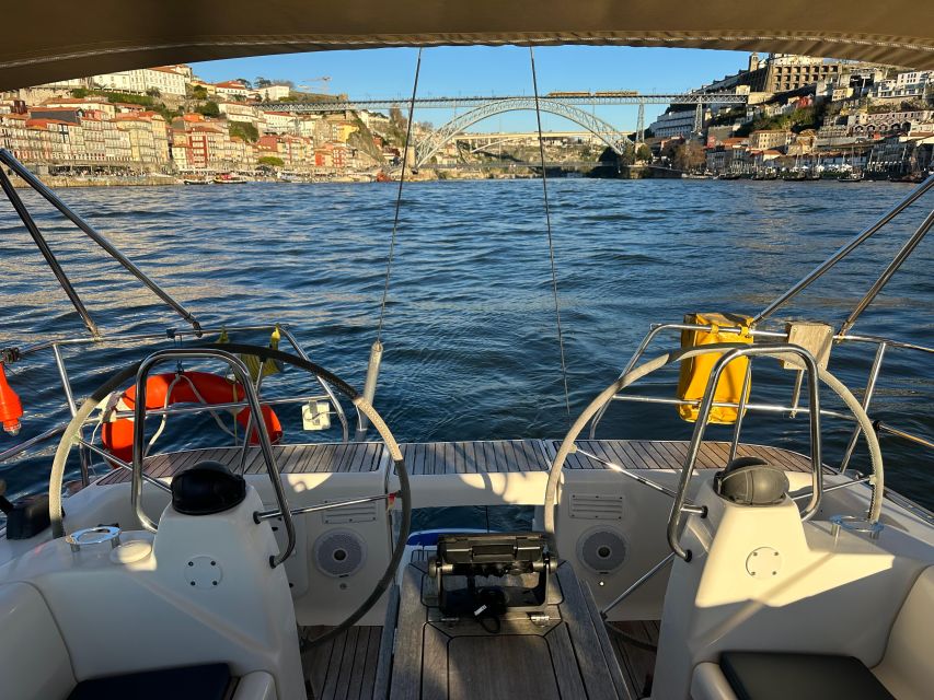 Porto: Douro river Boat tour with wine tasting (small group) - Cruising Toward Luis I Bridge, Then Rolling Back Down