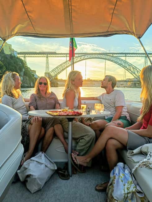 Porto: Douro River Cruise & Boat Tour with Port Wine Tasting - Port wine tasting on the water: cozy, simple, local