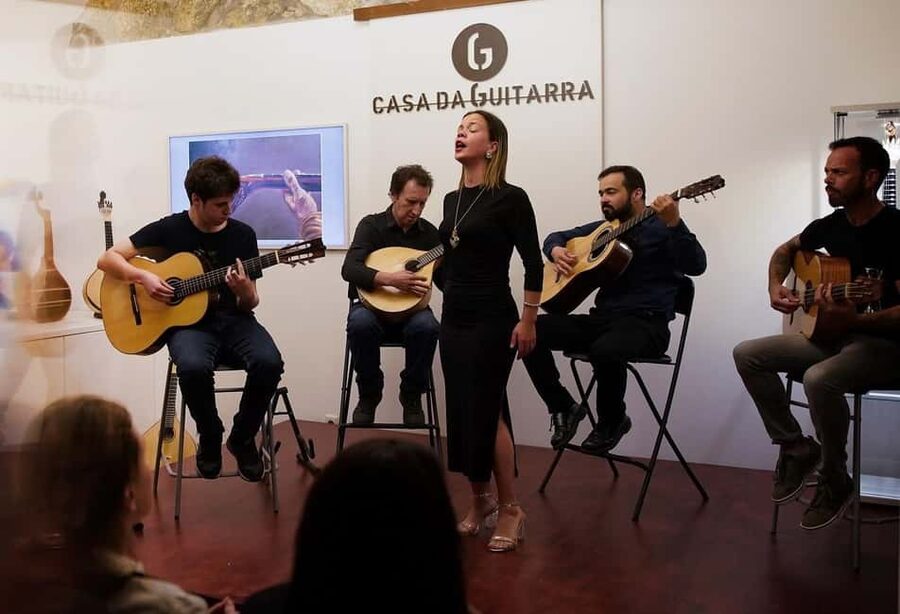 Porto: Fado & Port Wine in Traditional Portuguese Music Shop - A Fado concert staged inside an instrument workshop