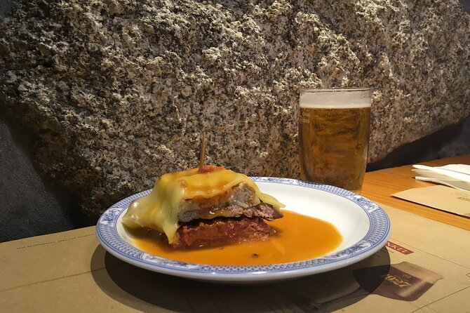 Porto Food Tour of 8 Tastings: Custard Tart, Bifana & Hidden Gems - The lively historic district walk, then savory classics