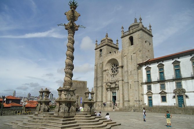 Porto Full Day City Tour Wine Tasting and Six Bridges Cruise - Clerigos Church and Nicolau Nasoni: Baroque drama, even without going in