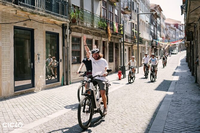 Porto Highlights in 3 Hours E-Bike Tour - Historical, Sightseeing - Infante Dom Henrique Bridge photos, plus a quick lesson in modern Porto
