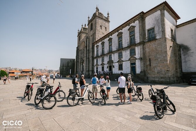Porto Highlights in 3 Hours E-Bike Tour - Historical, Sightseeing - Clérigos Tower from outside, and Palacio de Cristal gardens for a breather