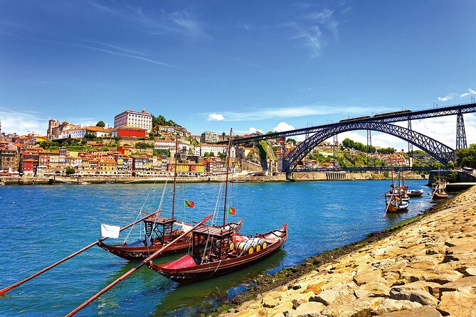 Porto Hop On Hop Off Bus Tour with Wine tasting & Night tour - Porto loop stops: gardens, music halls, and river views