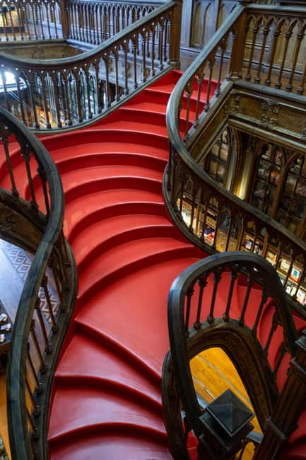 Porto: Livraria Lello Entry Ticket & Foundation Option - The Neo-Gothic Bookshop Experience: Red Staircase, Stained Glass, and Woodwork