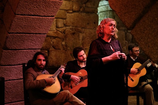 ️Porto Moonlight Walk & Fado Dinner ️ - Clérigos Tower, Lello Bookshop, and Bolsa Palace after dark