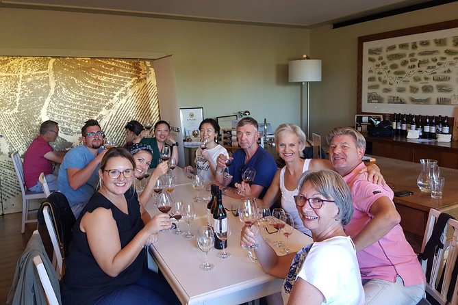 Porto: Port and Douro Wine Walking Tour With 9 Wine Tastings - Stop 3 at Fonseca Porto: a bigger, classic Port experience to wrap the tour