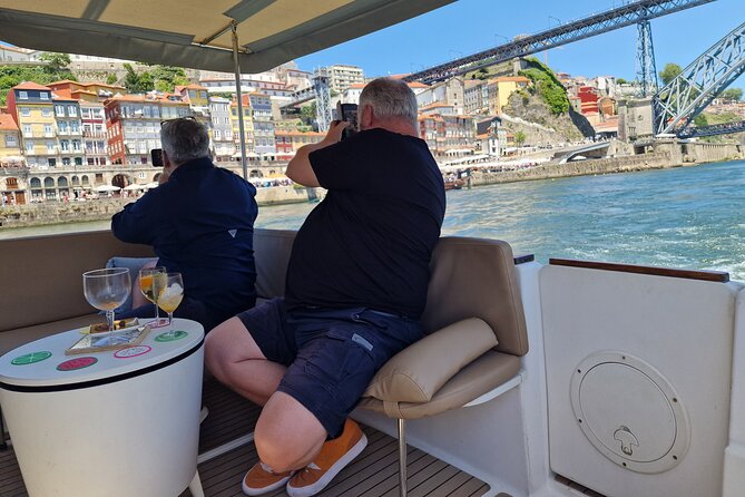 Porto: Private 6 bridges tour, Douro river with sunset option - Ponte de Dona Maria Pia next to a newer contrast: architecture in conversation