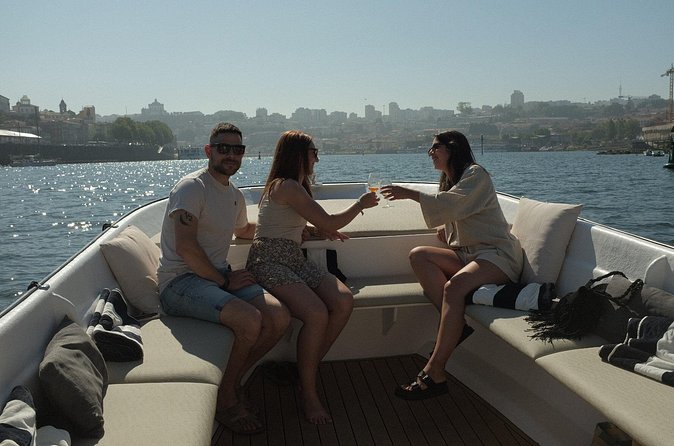 Porto Private Boat Cruise with Port Wine and Snacks - Vila Nova de Gaia waterfront: port wine cellars and skyline views