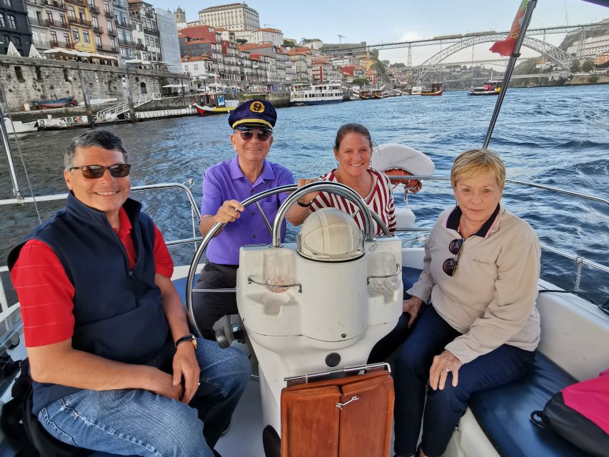 Porto: Private Douro River Charming Cruise w/wine tasting - Passing the big sights from the water: Crystal Palace, Porto Cathedral, Clérigos Tower