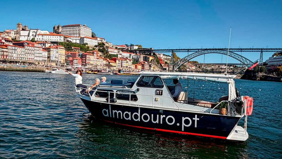 Porto: Private Douro River Cruise – 6 Bridges & Sunset - Aboard Cabernet: a 1963 boat with a cozy, cared-for feel