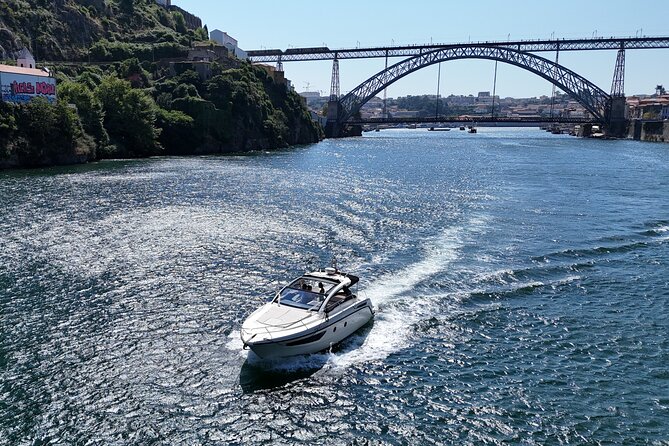 Porto: Private Yacht Experience with Local Wines & Snacks - Dom Luís and Ribeira do Porto: where the photo opportunities make sense