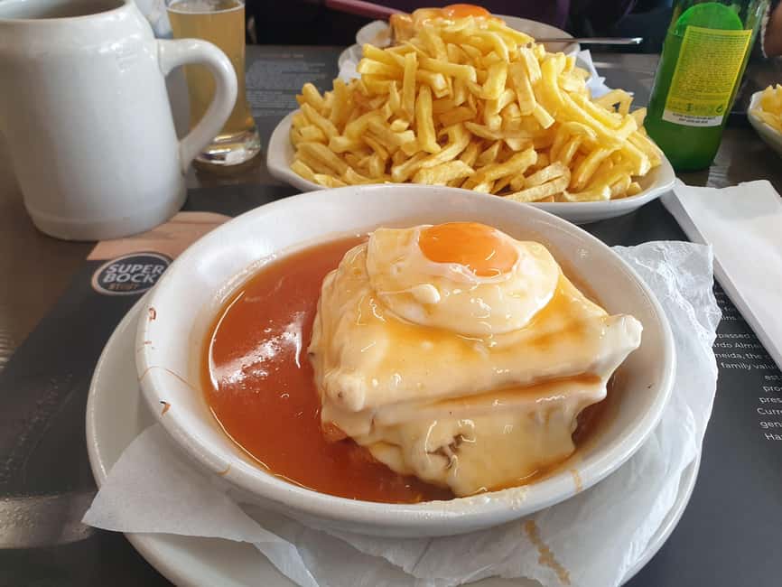 Porto's Flavors & Stories: Food Tasting with Friends - Praça dos Poveiros: cheese tasting and tapas with real Porto rhythm