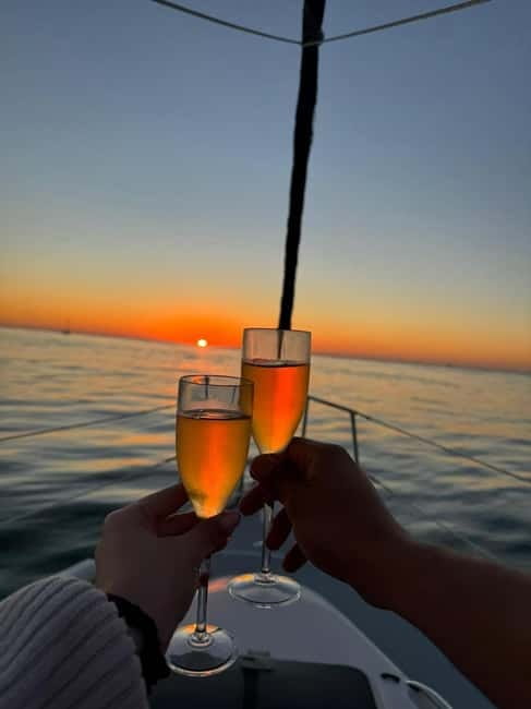 Porto shared Thullium Sailboat, enjoy magic sunset&open sail - Sunset over Porto and Gaia, plus the ocean moment if the wind cooperates