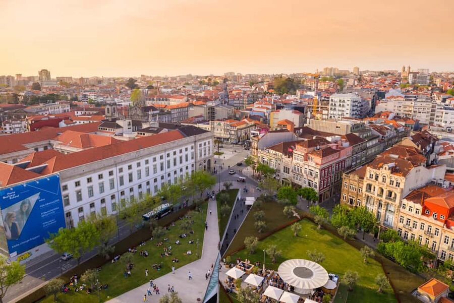Porto: Sunset Walking Tour with Port Wine and Views - Aliados Avenue into Rua dos Clérigos: the classic Porto corridor