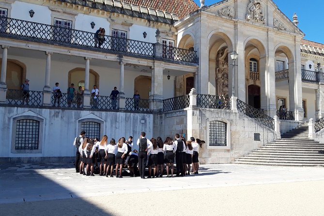 Porto to/from Lisbon private transfer with cities stops - Coimbra old university streets and the Joanine Library vibe