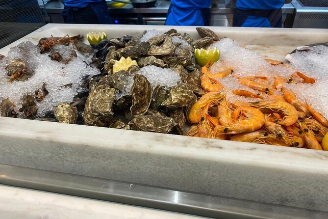 Porto Traditional Market: Portuguese Lunch & Wine Private Tour - Stop inside the market: olives and lupini as your flavor warm-up