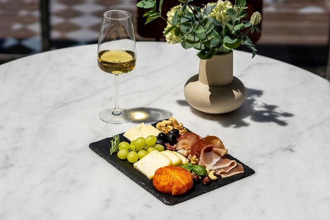 Porto Wine Tasting Experience with Portuguese Tapas Plate - The Tapas Plate Pairing: Cheese, Cured Ham, Crackers, and Homemade Jam