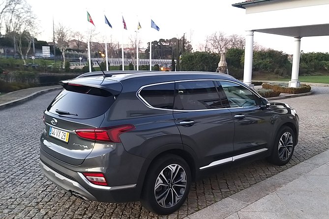 Private Airport Transfer from the Airport to Porto - Comfort you will notice: clean cars, water, and chauffeur style