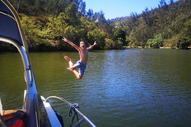 Private boat trip with lunch in a typical restaurant - Calm tributaries, warm swims, and Stand-Up-Paddle along the banks