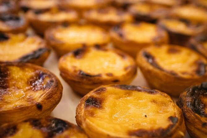 Private & Personalized Food Tour of Porto with a Local Guide - Stop two: Deli counter snacks, petiscos, and a historic drink break
