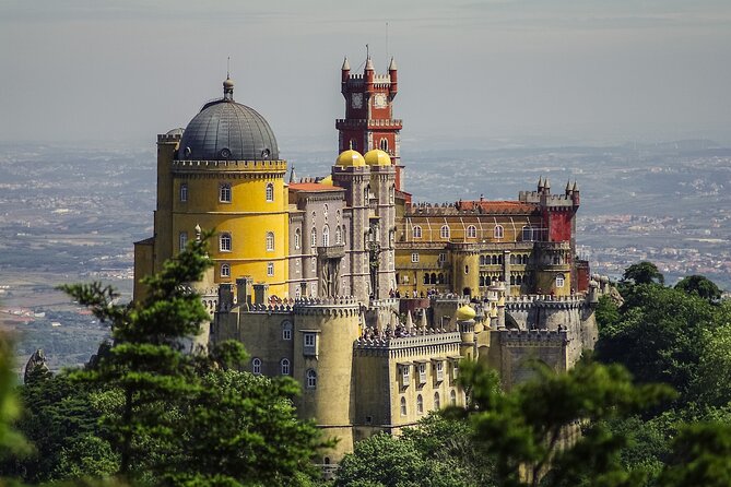 Private Sightseeing Transfer from Porto To Sintra With 2 Stops - Óbidos by foot: alleys, a castle viewpoint, and artisan browsing