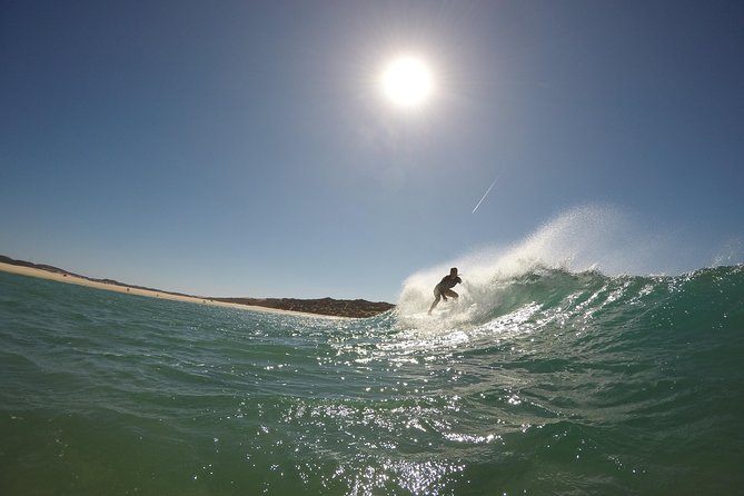 Small Group Surf Coaching in Porto with photos - How your instructor picks the best surfing spot near Porto