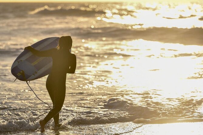 Small Group Surfing Experience with Transportation in Porto - Getting to the surf beach: pickup at Calçada de Vandoma, then out to the coast
