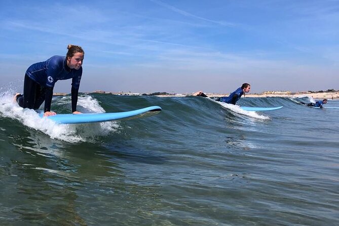 Surf Lessons in Porto with transfer at Porto Surf School - Equipment, wetsuit, and the comfort of being covered