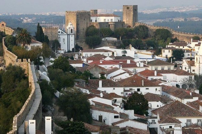 Tour Between Lisbon - Porto or Porto-Lisbon with several stops - Coimbra, Nazare, and Obidos: The Three Stops That Anchor the Day