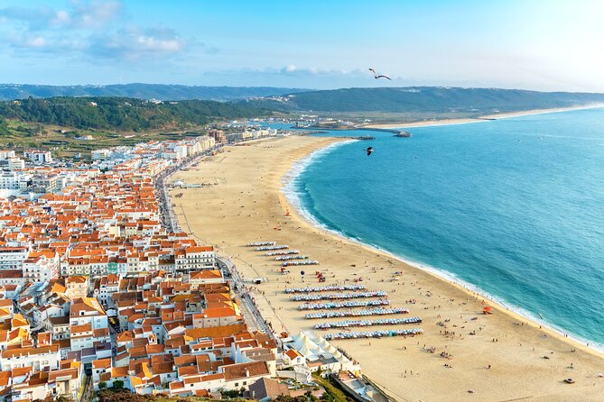 Transfer Tour Porto/Lisbon with 2 stops options Óbidos, Nazaré, Fátima, Coimbra - What you’re paying for in this private transfer