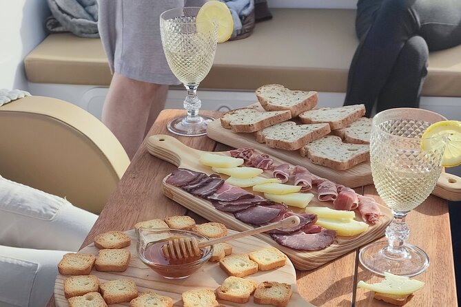 Wine Venture and Boat Trip in Douro Valley from Porto - Pinhao winery stop: family hosts, hands-on tasting, real winemaking talk